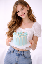  light blue cake with white frosting and sprinkles sydney 