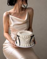 white cake with black ribbons , Sydney 