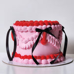 Pink and red buttercream birthday cake with black bow details Sydney next day delivery